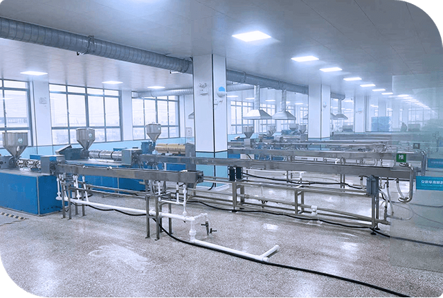 Wide-angle shot of Nanjing Haolyland's spacious warehouse, stocked with environmentally friendly packaging materials ready for shipment.